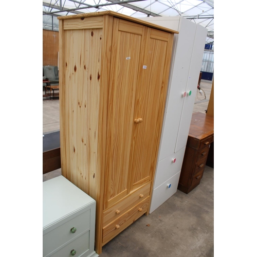 2775 - A MODERN PINE TWO DRAWER WARDROBE WITH TWO DRAWERS TO BASE, 30