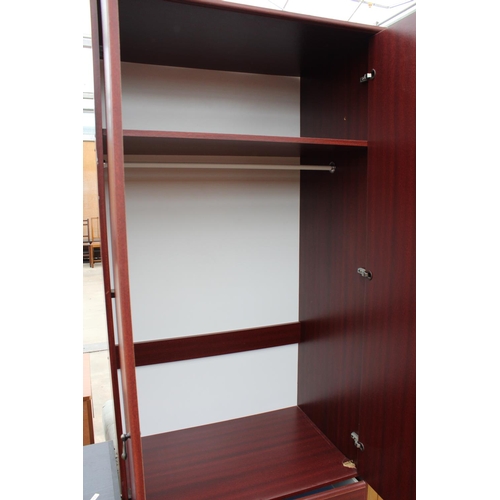 2779 - A MODERN MAHOANY EFFECT TWO DOOR WARDROBE WITH TWO DRAWERS TO BASE, 31