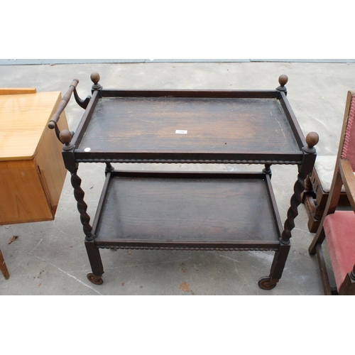 2786 - AN EARLY 20TH CENTURY OAK TWO TIER BARLEY-TWIST TROLLEY