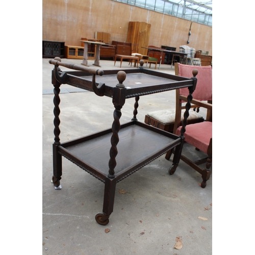 2786 - AN EARLY 20TH CENTURY OAK TWO TIER BARLEY-TWIST TROLLEY