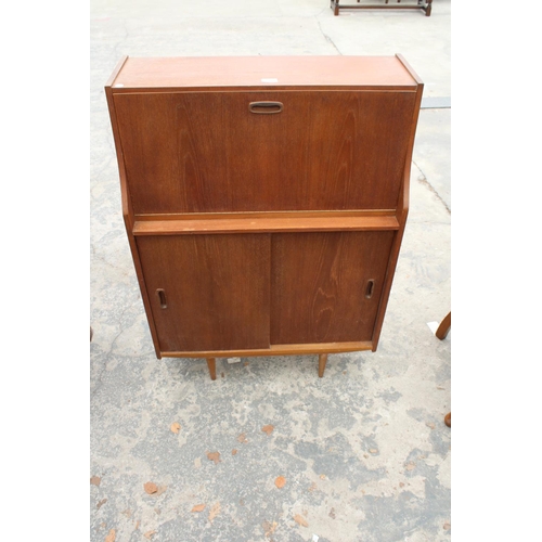 2789 - A RETRO TEAK BUREAU  WITH SLIDING DOORS TO BASE, 30