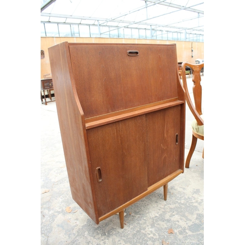 2789 - A RETRO TEAK BUREAU  WITH SLIDING DOORS TO BASE, 30