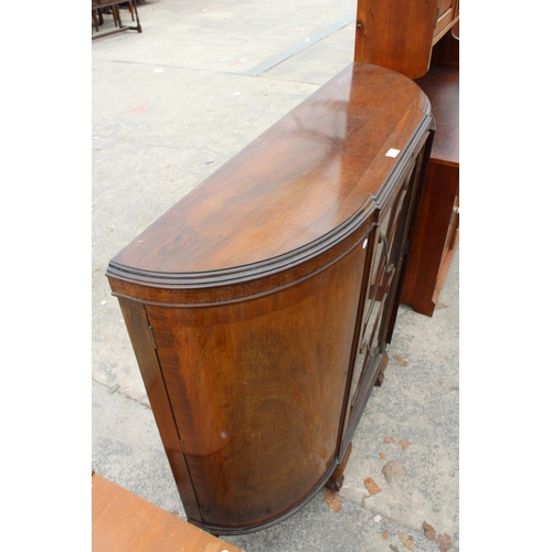 2791 - A MID 20TH CENTURY MAHOGANY BOW END DISPLAY CABINET ON BALL AND CLAW FEET, 48