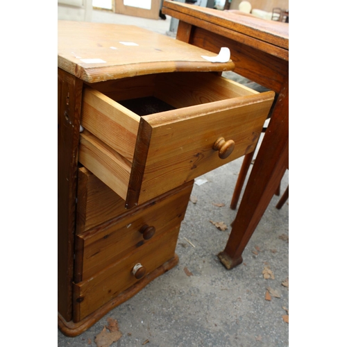 2794 - A MODERN PINE FOUR DRAWER BEDSIDE CHEST