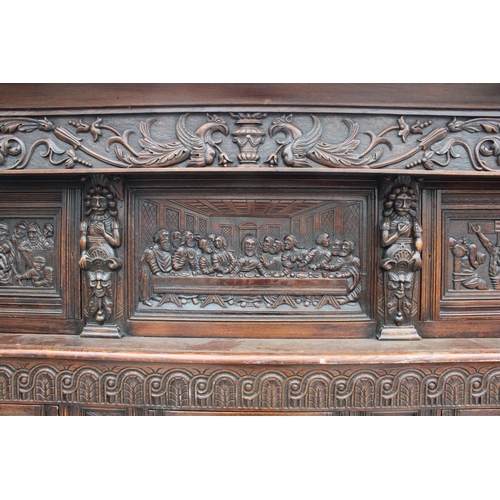 2799 - AN OAK GEORGE III STYLE COURT CUPBOARD WITH CARVED PANELS, THREE DEPICTING THE BIRTH AND CRUXIFICTIO... 