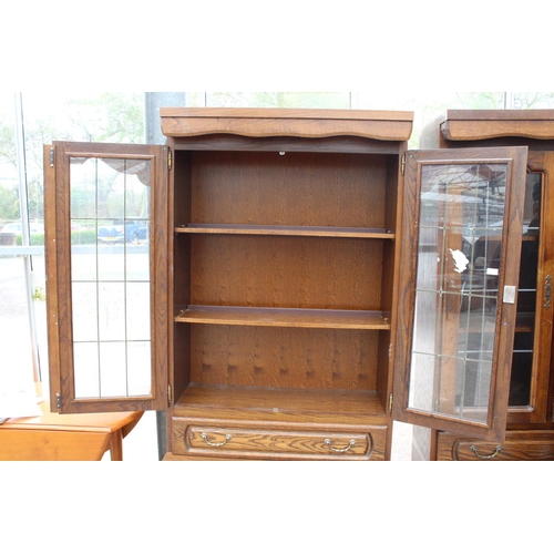 2803 - A MODERN OAK CABINET WITH GLAZED AND LEADED UPPER PORTION, 37