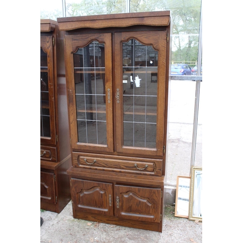 2804 - A MODERN OAK CABINET WITH GLAZED AND LEADED UPPER PORTION, 37