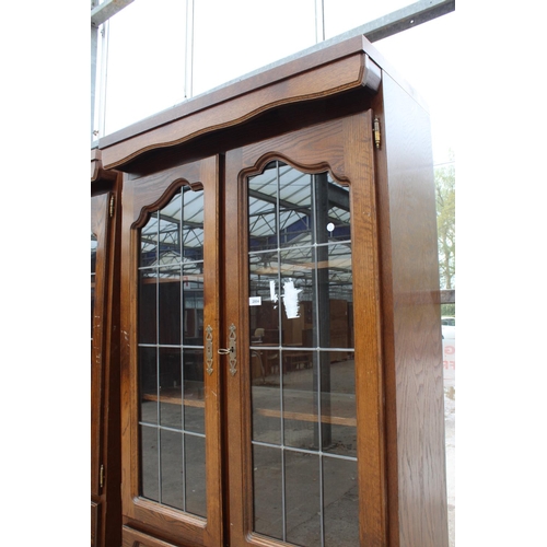 2804 - A MODERN OAK CABINET WITH GLAZED AND LEADED UPPER PORTION, 37