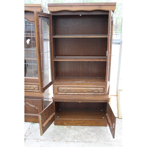 2804 - A MODERN OAK CABINET WITH GLAZED AND LEADED UPPER PORTION, 37