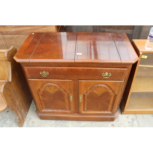 2809 - A MODERN HARDWOOD SIDEBOARD/BUFFET CABINET WITH FOLD-OVER TOP, SINGLE DRAWER AND TWO CUPBOARDS, 39