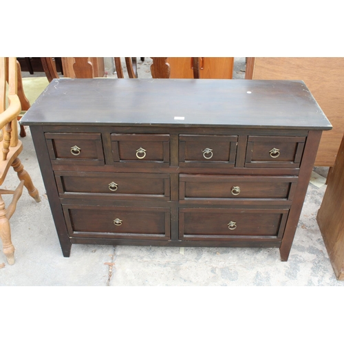 2811 - A MODERN HARDWOOD SIDEBOARD ENCLOSING 4 SHORT AND 4 LONG DRAWERS, 47