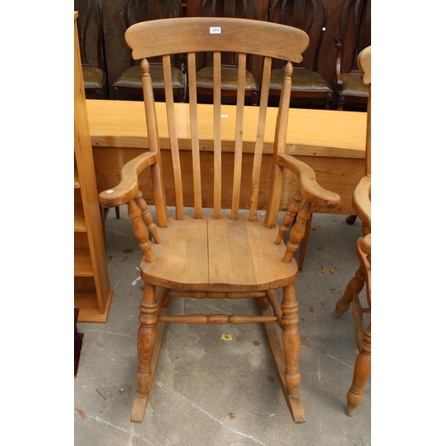 2814 - A VICTORIAN STYLE BEECH ROCKING CHAIR