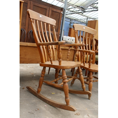 2814 - A VICTORIAN STYLE BEECH ROCKING CHAIR