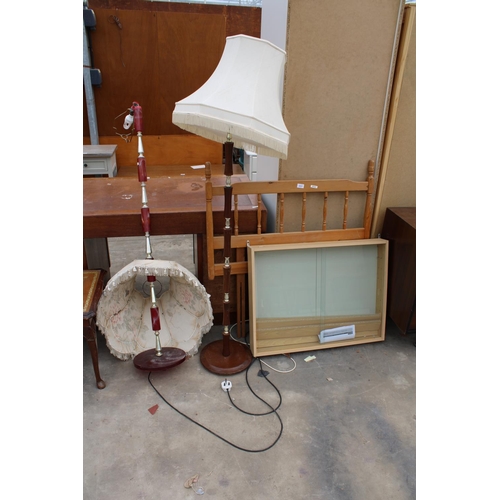 2831 - A PINE SINGLE HEADBOARD, TWO STANDARD LAMPS AND A DISPLAY CASE