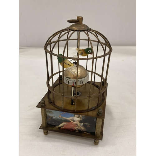 14 - A BRASS MECHANICAL BIRD CAGE CLOCK SEEN WORKING BUT NO WARRANTY