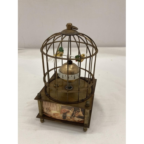 14 - A BRASS MECHANICAL BIRD CAGE CLOCK SEEN WORKING BUT NO WARRANTY