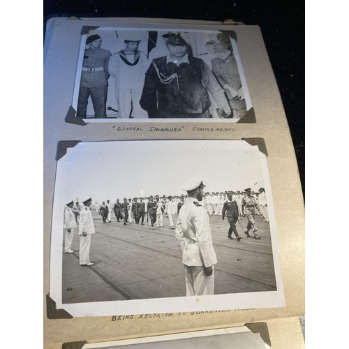 320A - A WORLD WAR II PHOTOGRAPH ALBUM CONTAINING PHOTOGRAPHS OF THE JAPANESE SIGNING OF THE INSTRUMENT OF ... 