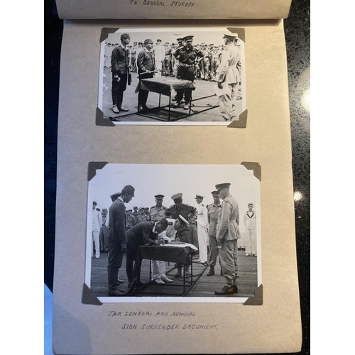 320A - A WORLD WAR II PHOTOGRAPH ALBUM CONTAINING PHOTOGRAPHS OF THE JAPANESE SIGNING OF THE INSTRUMENT OF ... 