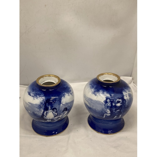 45 - A PAIR OF ROYAL DOULTON BLUE CHILDREN SERIES VASES HEIGHT 17.5 CM