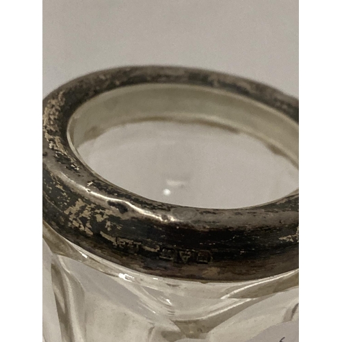 52 - THREE SILVER ITEMS TO INCLUDE A CUT GLASS VASE WITH SILVER RIM, A BIRMINGHAM HALLMARKED SILVER NAPKI... 