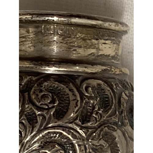 52 - THREE SILVER ITEMS TO INCLUDE A CUT GLASS VASE WITH SILVER RIM, A BIRMINGHAM HALLMARKED SILVER NAPKI... 