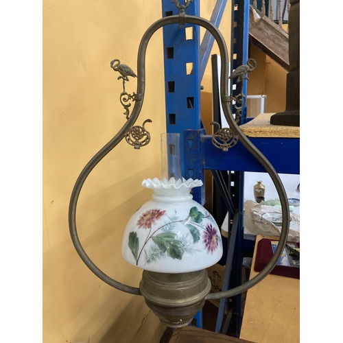 61 - A VINTAGE HANGING OIL LAMP WITH PAINTED GLASS SHADE AND FLAMINGO DECORATION