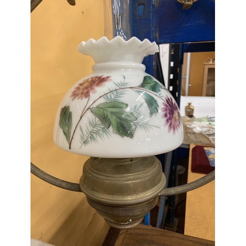 61 - A VINTAGE HANGING OIL LAMP WITH PAINTED GLASS SHADE AND FLAMINGO DECORATION