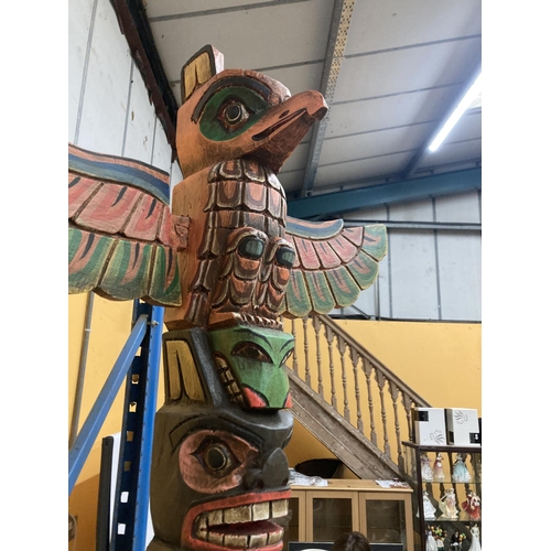 62 - A CARVED WOODEN TOTEM POLE