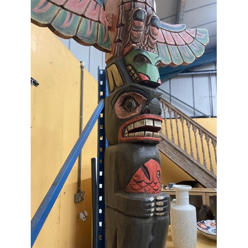 62 - A CARVED WOODEN TOTEM POLE