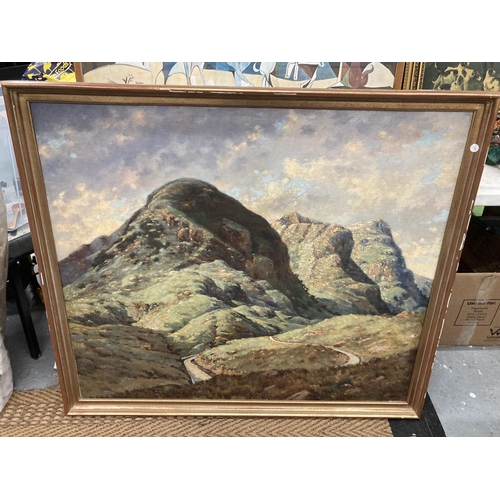 89 - A LARGE FRAMED OIL ON CANVAS OF A MOUNTAIN SCENE WITH A WINDING ROAD SIGNED TO LOWER RIGHT HAND CORN... 