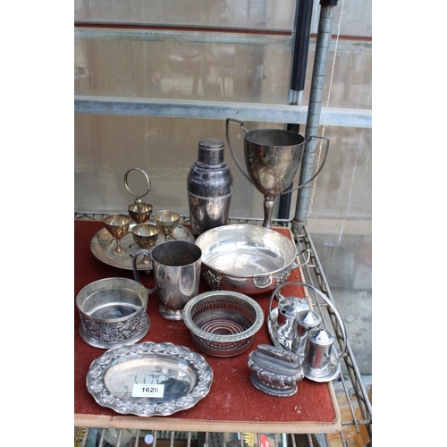 1620 - AN ASSORTMENT OF SILVER PLATED ITEMS TO INCLUDE A TROPHY, A COCKTAIL SHAKER AND WINE BOTTLE COASTERS... 