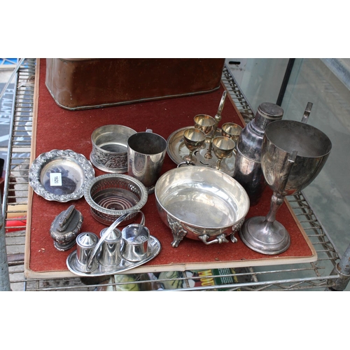 1620 - AN ASSORTMENT OF SILVER PLATED ITEMS TO INCLUDE A TROPHY, A COCKTAIL SHAKER AND WINE BOTTLE COASTERS... 