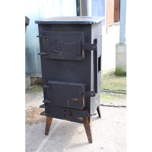 1643 - A VINTAGE CAST IRON STOVE