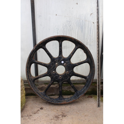 1646 - A VINTAGE CAST IRON WHEEL RIM