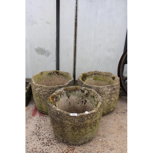 1647 - A SET OF THREE MATCHING RECONSTITUTED STONE GARDEN POTS