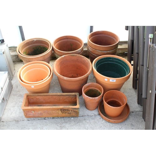 1660 - AN ASSORTMENT OF VARIOUS SIZED TERRACOTTA GARDEN POTS AND A TROUGH