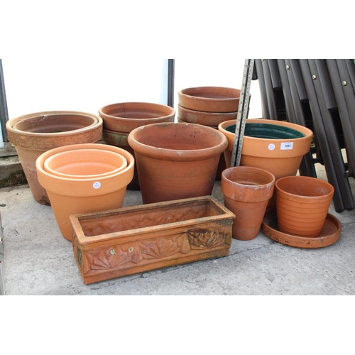 1660 - AN ASSORTMENT OF VARIOUS SIZED TERRACOTTA GARDEN POTS AND A TROUGH