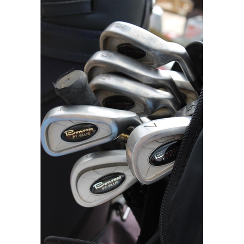 1760 - TWO GOLF BAGS AND AN ASSORTMENT OF GOLF CLUBS