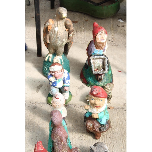 1787 - AN ASSORTMENT OF PAINTED CONCRETE GARDEN FIGURES