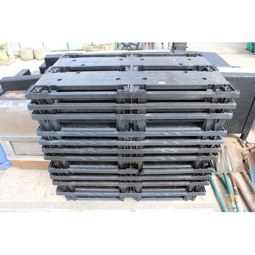 1804 - ELEVEN HARD PLASTIC TRANSPORT PALLETS