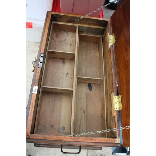 1809 - A VINTAGE WOODEN TOOL CHEST WITH FOUR WHEELS TO THE BASE