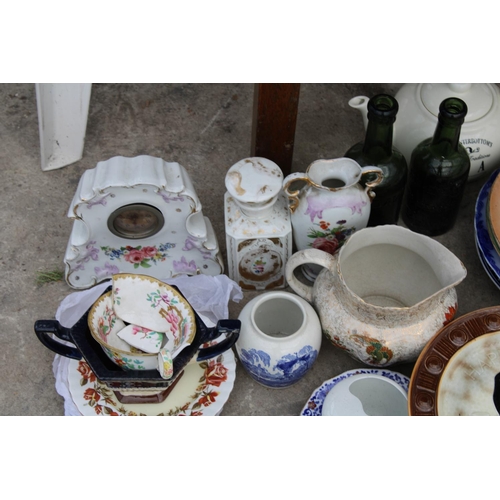 1814 - AN ASSORTMENT OF ITEMS TO INCLUDE CERAMIC PLATES, A CLOCK AND CUPS ETC