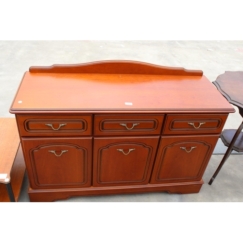 2861 - A MODERN CHERRY WOOD EFFECT SIDEBOARD ENCLOSING THREE DRAWERS AND THREE CUPBOARDS WITH RAISED BACK, ... 