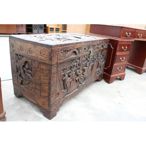 2869 - AN ORIENTAL CAMPHOR WOOD CARVED BLANKET CHEST, 41