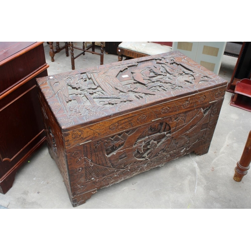 2869 - AN ORIENTAL CAMPHOR WOOD CARVED BLANKET CHEST, 41