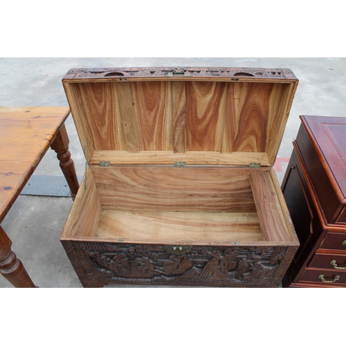 2869 - AN ORIENTAL CAMPHOR WOOD CARVED BLANKET CHEST, 41