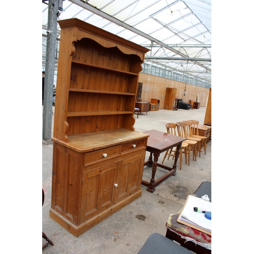 2876 - A MODERN PINE DRESSER WITH TWO DRAWERS AND CUPBOARD TO BASE AND PLATE RACK, 50