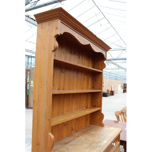 2876 - A MODERN PINE DRESSER WITH TWO DRAWERS AND CUPBOARD TO BASE AND PLATE RACK, 50