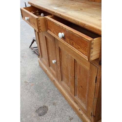 2876 - A MODERN PINE DRESSER WITH TWO DRAWERS AND CUPBOARD TO BASE AND PLATE RACK, 50