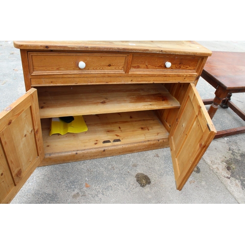 2876 - A MODERN PINE DRESSER WITH TWO DRAWERS AND CUPBOARD TO BASE AND PLATE RACK, 50